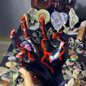 Black Brand Artistic Hand Sculpture with Red Accents